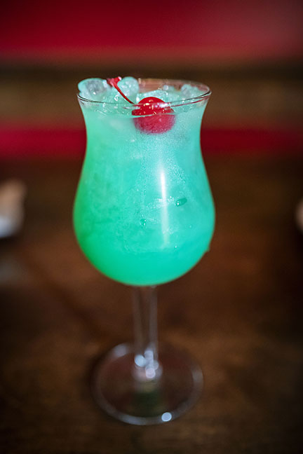 blue curacao cocktail with cherry