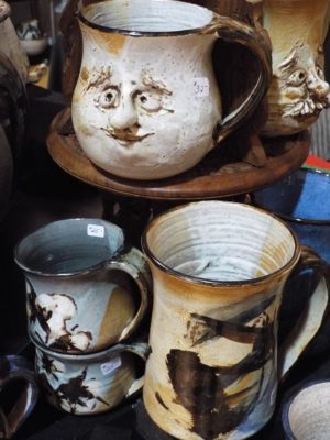 handmade pottery with face
